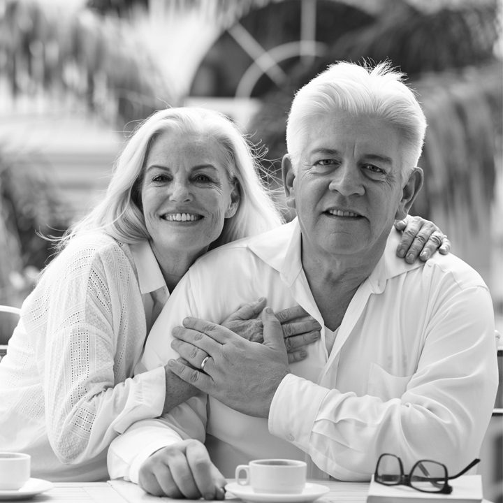 elderly couple smiling